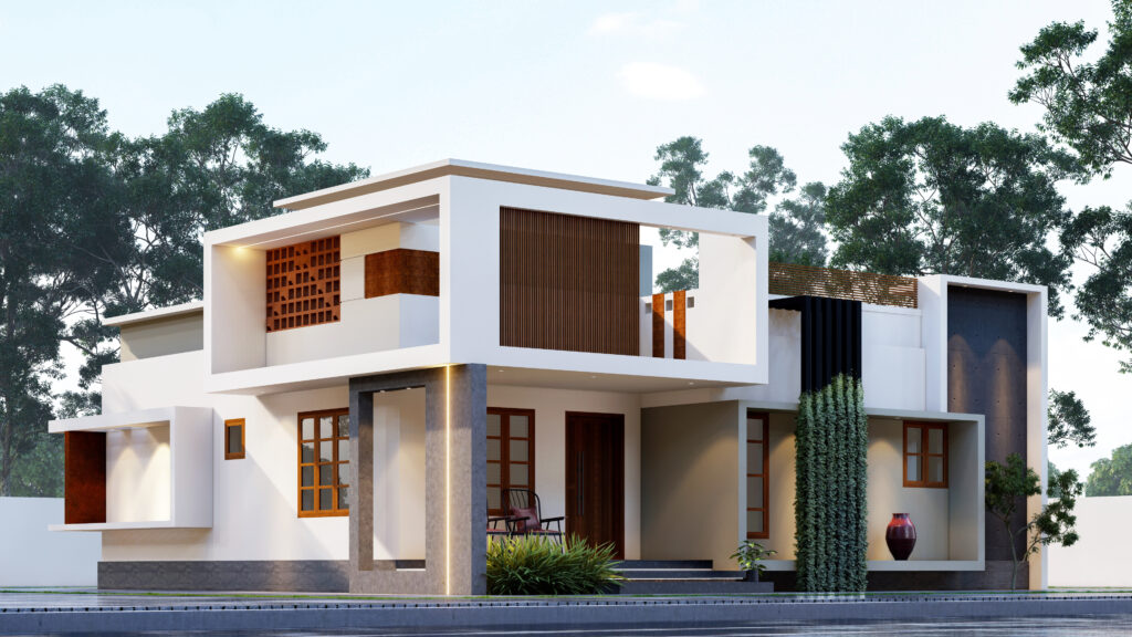 A stunning example of a box-style modern home in Kerala—minimalist in form, yet rich in detail. Flat roofs, large windows, and clean lines create a sleek silhouette, while natural materials like laterite and wood add warmth and tradition to the modern frame.
